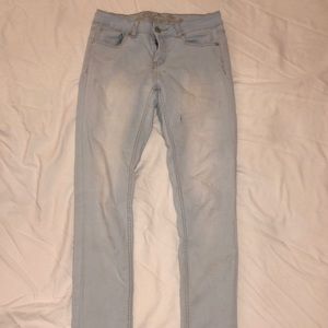 Light wash wax skinny jeans